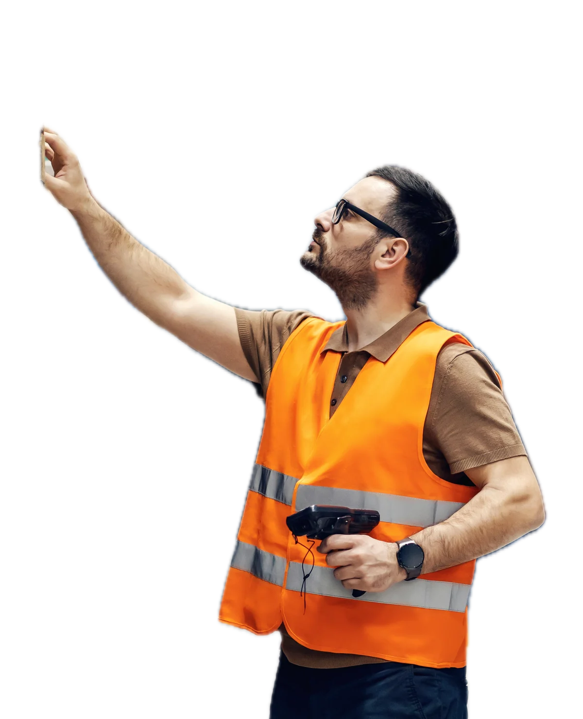 A warehouse worker in a high-visibility vest reaches up to a top-shelf location, a handheld scanner in his other hand